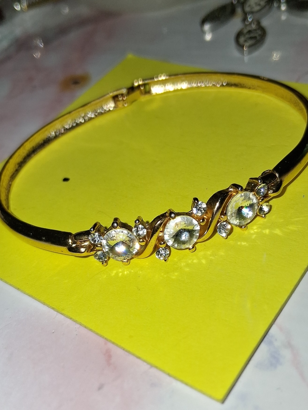 Avon Gold-Tone Crystal Swirl Bangle Bracelet